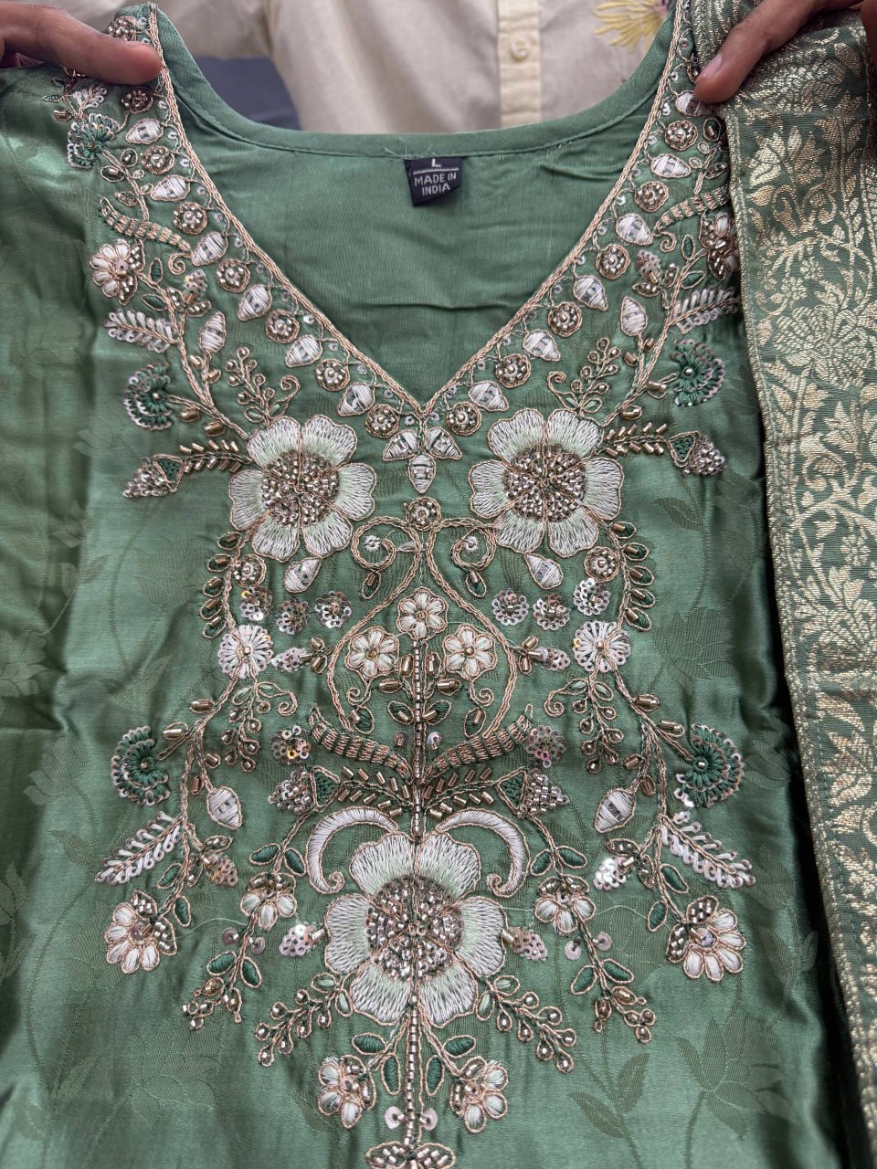 Featuring Beautiful Suit Sets in pure Malay Glass Tissue with Kanjivaram Hand Work Nack Suit Set